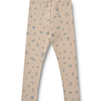 Beige pants with small floral pattern on a white background