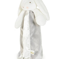 White plush bunny toy with a soft texture on a white background