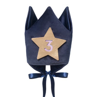 Navy blue crown with a gold star and number '3' on a white background