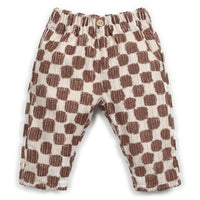Checkered pants with brown and white pattern on a white background