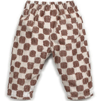 Checkered pants with brown and beige pattern on a white background