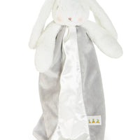 White plush bunny with a gray blanket on a white background