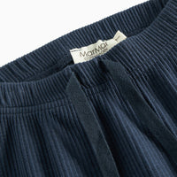 Navy blue ribbed pant with a brand label on a white background