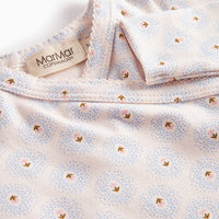 Baby blanket with floral pattern and 'MarMar Copenhagen' label on a white background