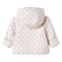White puffer jacket with small patterns on a white background