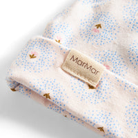 Floral patterned blanket with a Marmar label on a white background