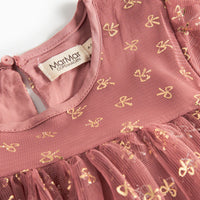 Pink dress with gold butterfly patterns and a visible brand label on a white background