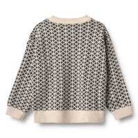 Patterned sweater with a geometric design on a white background
