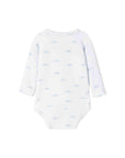 White baby onesie with blue cloud pattern on a white background