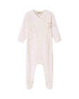 Baby onesie with a bow on a white background