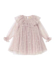 A light pink long-sleeve tulle dress for toddlers, featuring a large ruffled collar, delicate white embroidered polka dots, and matching ruffled cuffs on the sleeves, shown against a plain white background.