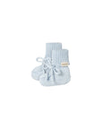 Pair of light blue knit baby booties with a visible brand label on a white background