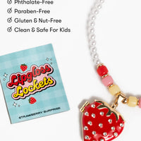 Strawberry-themed necklace with 'Lipgloss Lockets' packaging on a white background