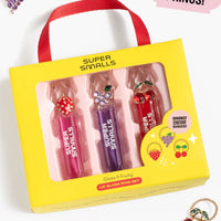 Super Smalls lip gloss set with three lip glosses and three rings in a yellow box on a white background.