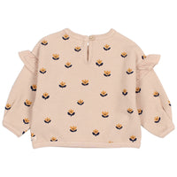 Beige sweater with floral patterns on a white background