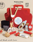 Toy medical kit with red bag, various toy medical items, and 'Hand Made with Love' text on a beige background.