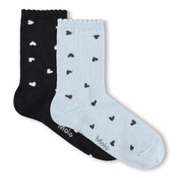 Two pairs of socks, one black and one light blue with heart patterns, on a white background.