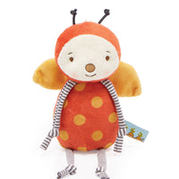 Stuffed toy ladybug with a white background