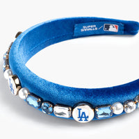 Blue headband with decorative elements and MLB logo on a white background