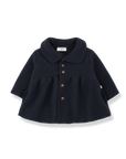 Navy blue coat with brown buttons on a white background