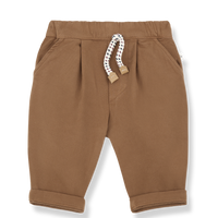 Brown baby pants with a white and brown drawstring on a white background