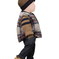 Child's outfit with a plaid vest, striped shirt, pants, and shoes on a white background