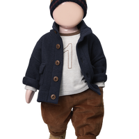 Doll wearing a navy coat, brown pants, and a beanie on a white background