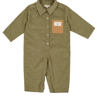 Green baby romper with a brown pocket on a white background