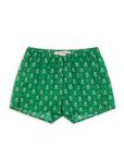 Green shorts with a small pattern on a white background