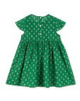 Green dress with floral pattern on a white background