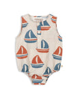 Baby romper with sailboat pattern on a white background