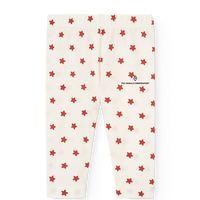 White pants with red star pattern on a white background
