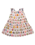 Children's dress with colorful animal print on a white background