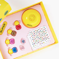 Colorful jewelry set with a yellow box on a white background