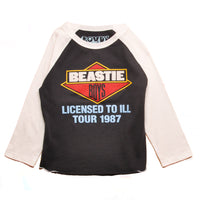 Black and ecru baseball shirt with Beastie Boys logo and text on a white background