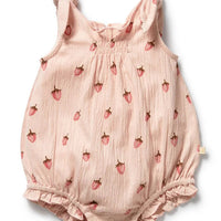 Pink baby romper with strawberry pattern on a white background