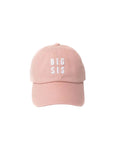 Pink cap with 'BIG SIS' text on a white background