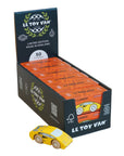 Box of Le Toy Van toy cars with a single car in front on a light background