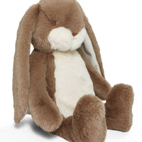 Brown plush bunny toy on a white background
