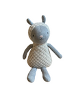 A handmade plush toy sheep made from textured knit fabric in light gray and cream, shown against a plain white background.