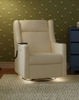 Beige recliner chair in a room with green wallpaper and a blue dresser.