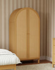 Wooden wardrobe with wicker design in a bedroom setting