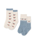 Two pairs of socks with cherry design on a white background