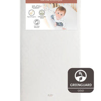 Baby mattress with Babyletto branding and Greenguard Gold certification on a white background