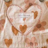 Heart-shaped label on a garment with floral pattern