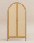 Wooden cabinet with rattan doors on a beige background