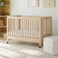 MAKI PORTABLE FOLDING CRIB WITH TODDLER BED CONVERSION KIT - WASHED NATURAL