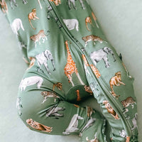 Green fabric with animal pattern on a light green background