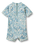 Children's swimsuit with blue floral pattern on a white background