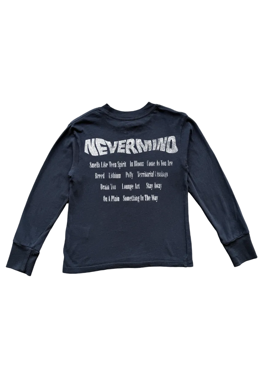 A dark navy blue long-sleeve t-shirt with a white graphic print on the back. The graphic features the word 'NEVERMIND' in a distressed, textured font, followed by a list of song titles in a smaller, clean font.